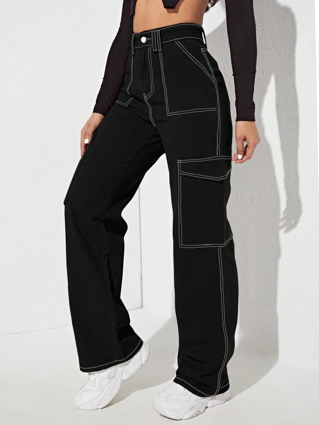 Long denim trousers with front button and pockets